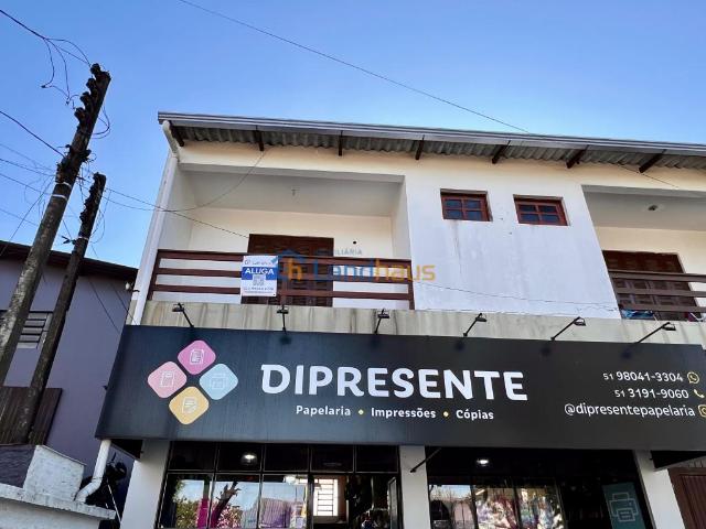 Apartamento com 2 dormitórios, 1 vaga para alugar por R$ 1.590,00