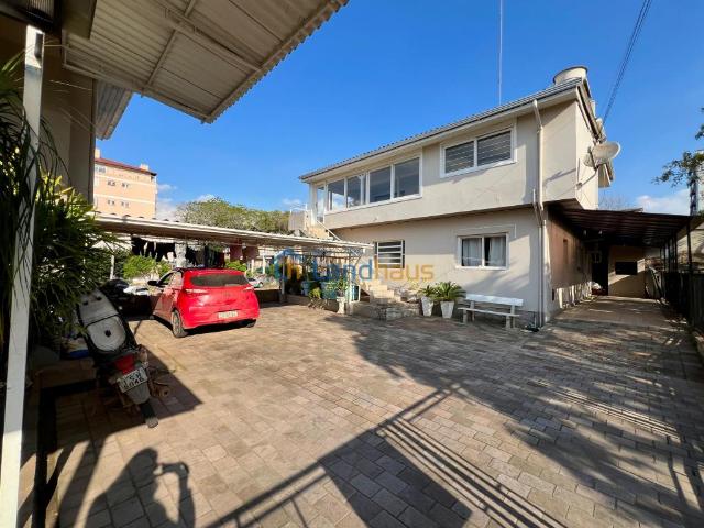 Apartamento com 2 dormitórios, 1 vaga para alugar por R$ 1.600,00