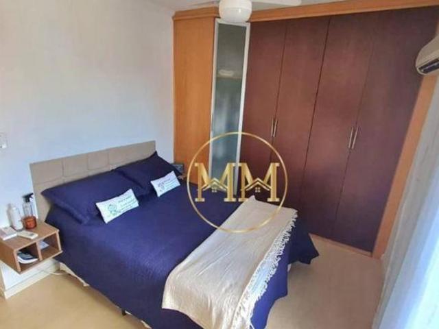 Apartamento com 2 dormitórios à venda, 103 m² por R$ 850.000,00 Ponta da Praia Santos/SP