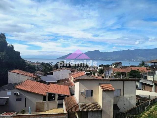 Apartamento com 2 dormitórios à venda, 107 m² por R$ 700.000,00 S F Praia São Sebastião/SP