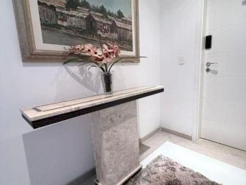 Apartamento com 2 dormitórios à venda, 135 m² por R$ 1.900.000,00 Ponta da Praia Santos/SP