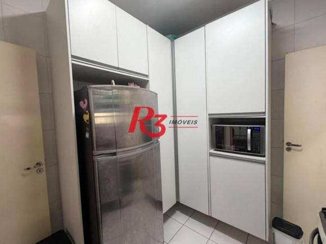 Apartamento com 2 dormitórios à venda, 62 m² por R$ 390.000,00 Ponta da Praia Santos/SP
