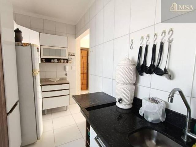 Apartamento com 2 dormitórios à venda, 63 m² por R$ 435.000 Vila Assunção Praia Grande/SP