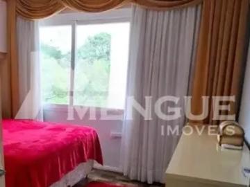 Apartamento com 2 dormitórios e 1 vaga à venda no bairro Humaitá, em Porto Alegre