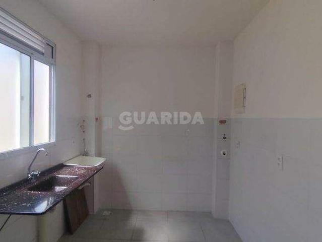 Apartamento com 2 dormitórios e 1 vaga de garagem, no bairro Restinga COD: 20434