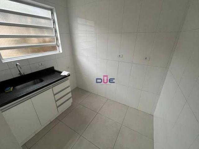 Apartamento com 2 dormitórios em 1 andar de frente com garagem box privativa à venda, 76 m² por R$