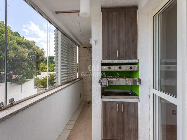 Apartamento com 2 dormitórios, sendo 1 suíte, e 1 vaga de garagem no Bairro Cavalhada