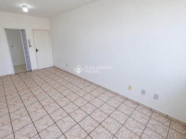 Apartamento com 2 quartos e 56m² para alugar em Praia Comprida, São José