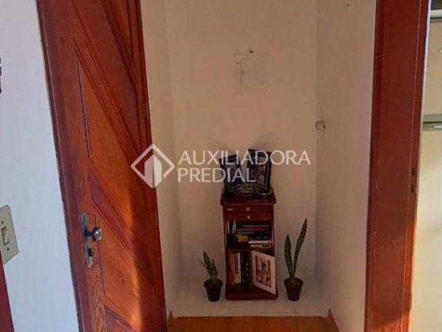 Apartamento com área privativa de 42,36 m², banho social, living dois ambientes, cozinha e área de