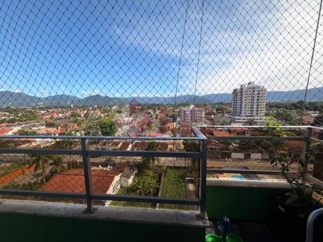 Apartamento com prédio frente mar em Caraguatatuba, andar alto com vista da serra