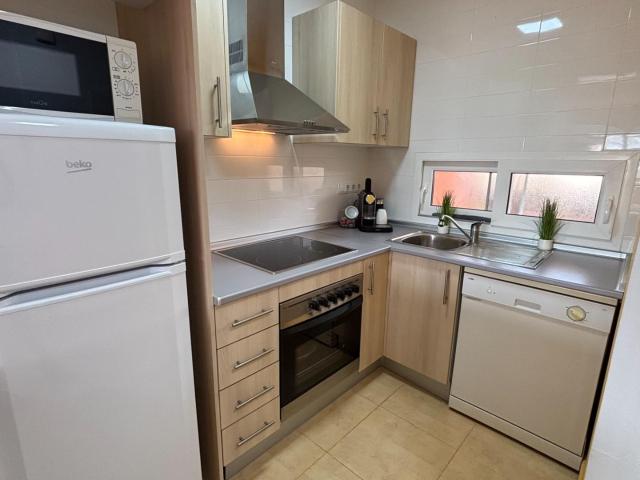 Apartamento con orientación sur, vistas al lago y piscina comunitaria en La Isla, Condado de Alhama