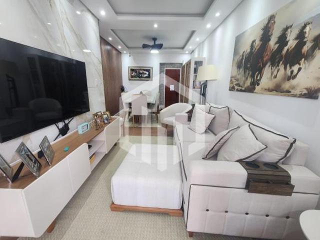 Apartamento de 78 m² com varanda, sala ampla e área de lazer com churrasqueira no Tupi, Praia Grande