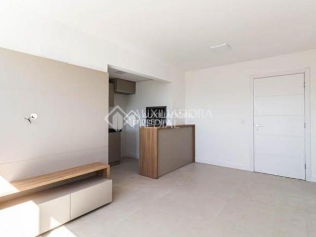 Apartamento de 02 quartos, churrasqueira, com vaga de garagem no bairro Santo Antonio