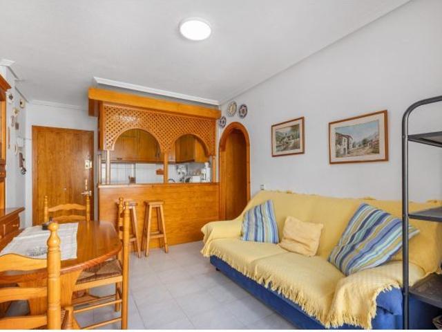 APARTAMENTO DE 1 DORMITORIO CON GARAJE, TRASTERO Y PISCINA COMUNITARIA A 400 METROS DE LA PLAYA DE L