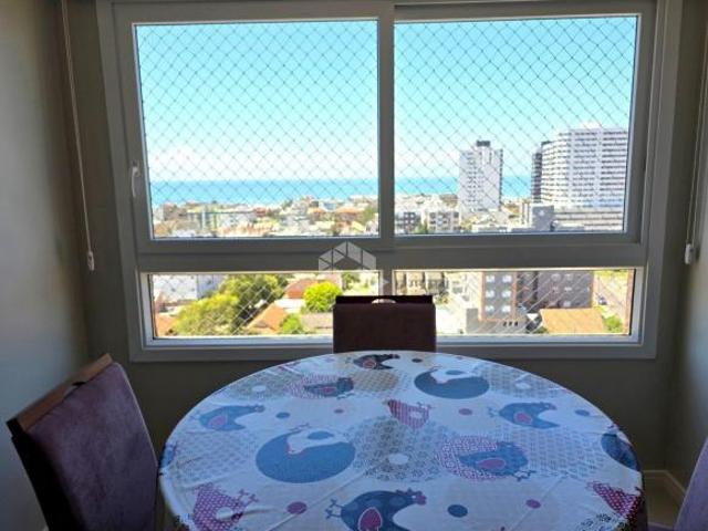 Apartamento de 2 dormitórios com 1 vaga em Tramandaí RS