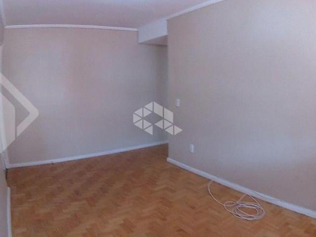 Apartamento de 2 dormitórios, sacada, 2 banheiros e vaga escriturada no bairro Menino Deus
