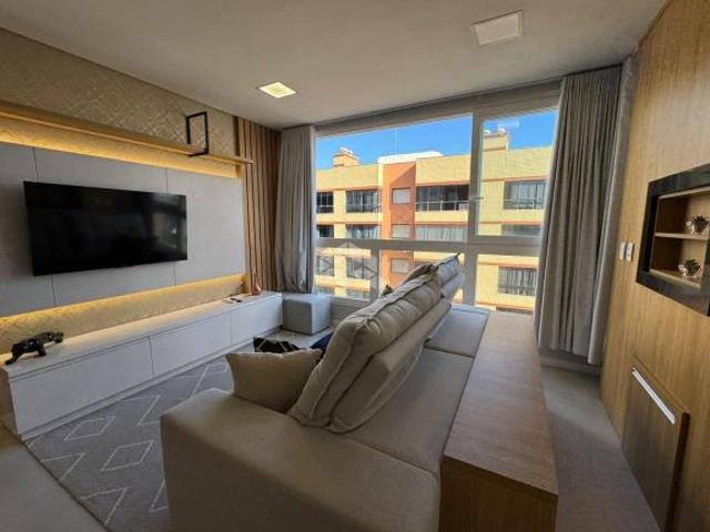 Apartamento de 2 dormitorios sendo 1 suite mobiliado com vaga de garagem em Capão da Canoa!