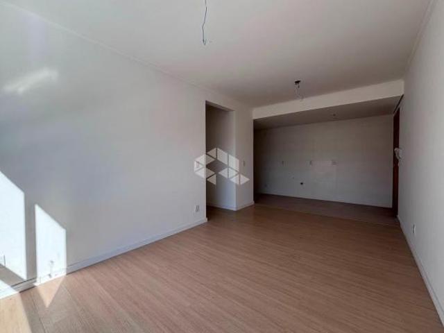 Apartamento de 2 dormitórios, sendo 1 suíte, próximo à UNISC