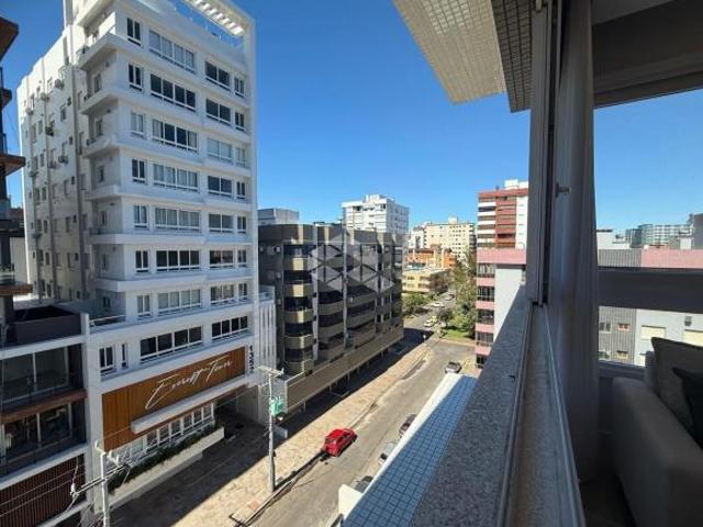 Apartamento de 3 dormitórios sendo 1 suíte mobiliado com vaga de garagem em Capão da Canoa