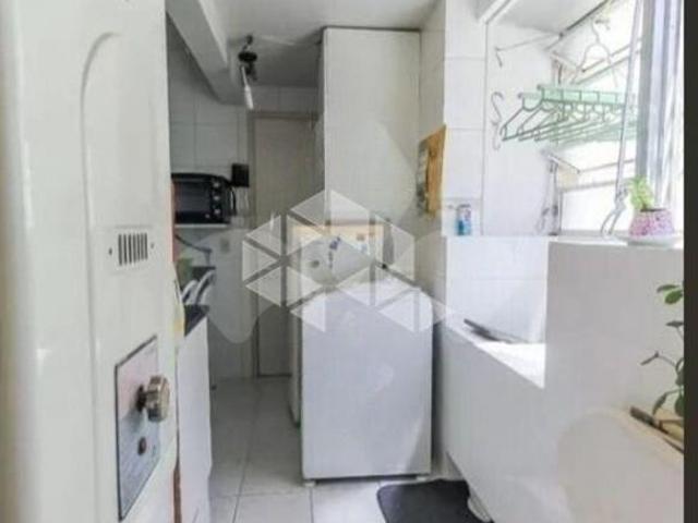 Apartamento de três dormitórios e vaga em frente á Praça