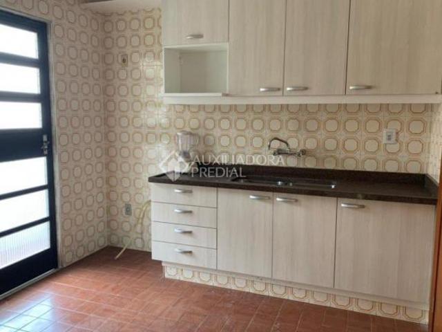 Apartamento de três dormitórios