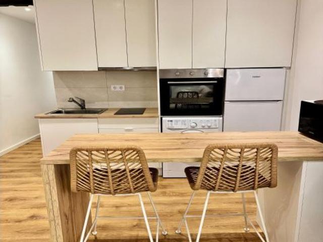 APARTAMENTO DE DISEÑO CON TERRAZA Y JARDÍN
