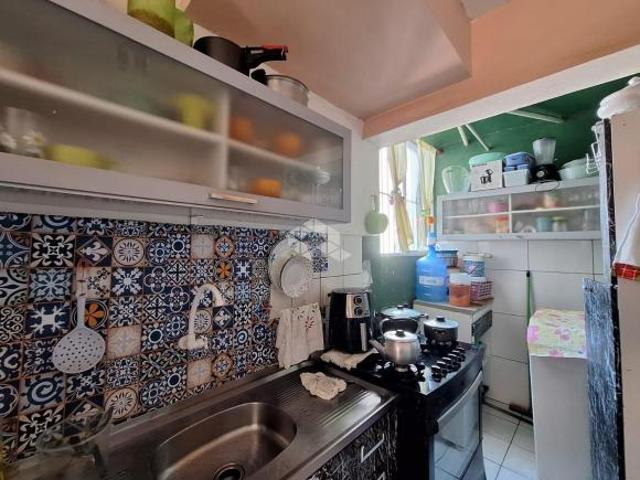 Apartamento de dois dormitorios com sacada e garagem rotativa no Sarandi