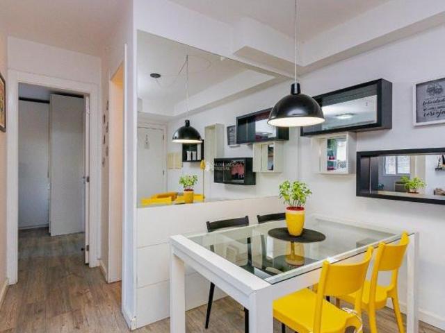 Apartamento dois dormitórios, sendo um suíte, cozinha americana, 1 vaga