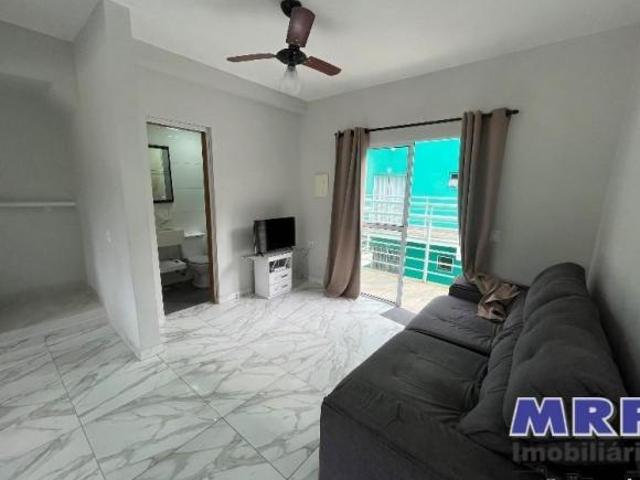 Apartamento duplex á venda em Ubatuba. 2 dormitórios. 2 vagas. Com piscina