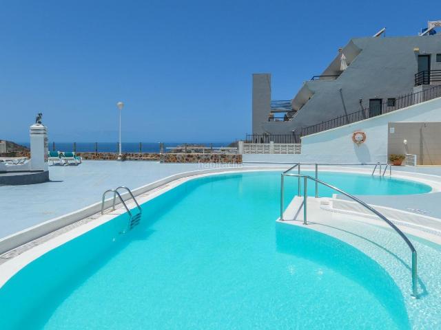 Apartamento en venta en Mogán, Puerto Rico. Apartamento con vistas al mar y terraza soleada en Amadores. Apartamentos.