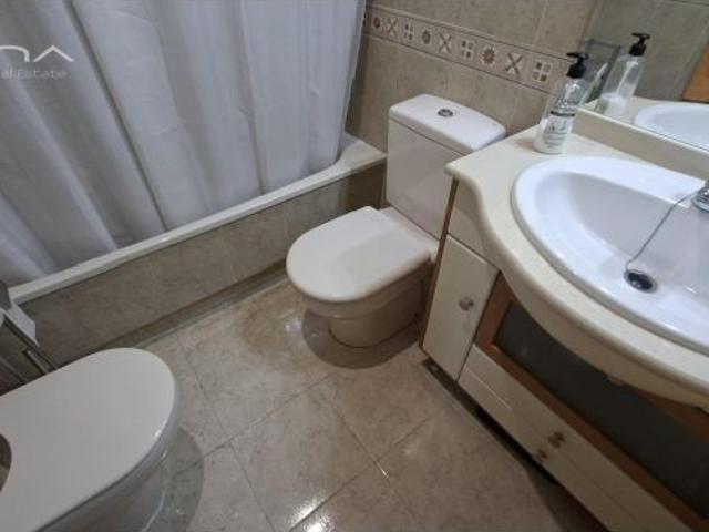 Apartamento en venta en Playa de Daimús a 150 m del mar con piscina comunitaria