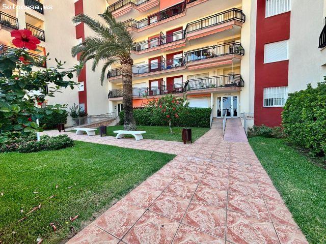 Apartamento en primera línea de playa de Gandia en residencial con piscina comunitaria, garaje y tra