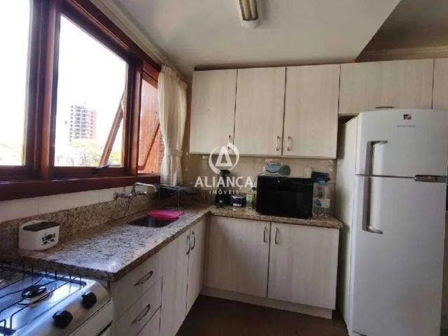 APARTAMENTO MOBILIADO 3 Dormitórios, sendo uma suite 1 Sala 1 Cozinha