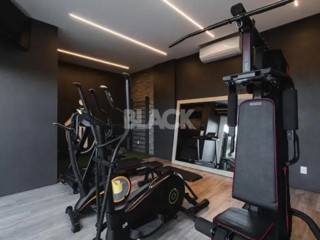 Apartamento mobiliado à venda no centro de Torres com dois dormitórios e vista da Lagoa do Violão