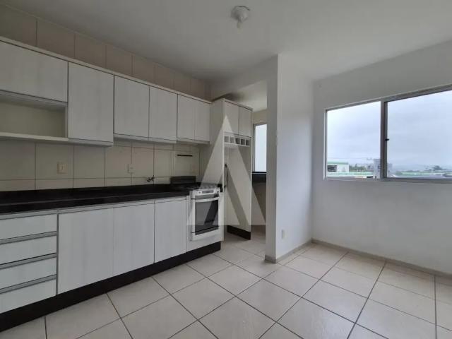 Apartamento no bairro Bom Retiro com 01 quarto, cozinha com armários e 01 vaga de garagem