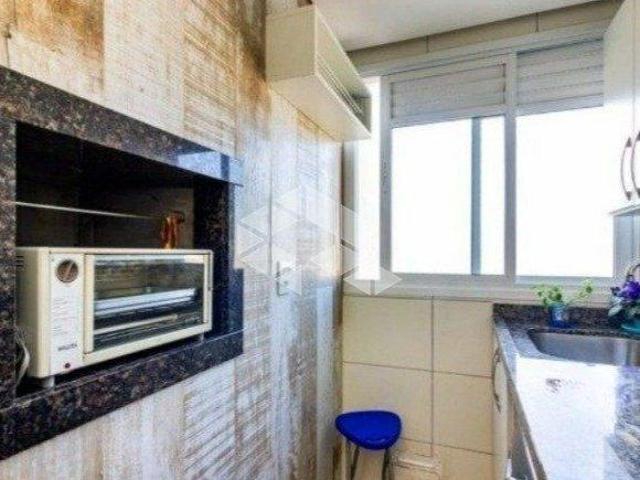 APARTAMENTO NO PARTENON DE 1 DORMITÓRIO E VAGA