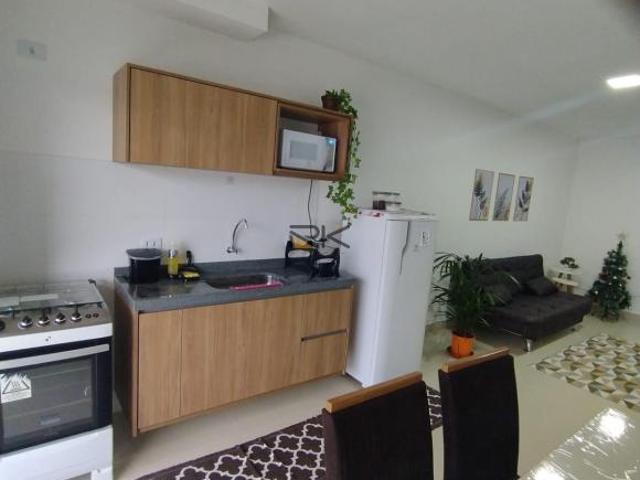 APARTAMENTO NO PEREQUE AÇU COM 2 DORMITÓRIOS SENDO 1 SUÍTE, PISCINA, ELEVADOR, VARANDA GOURMET COM C