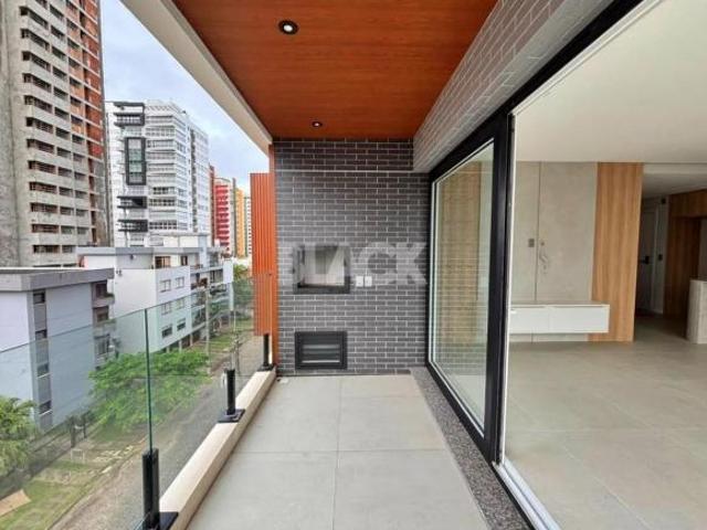 Apartamento novo 3 dormitórios com sacada em Torres RS