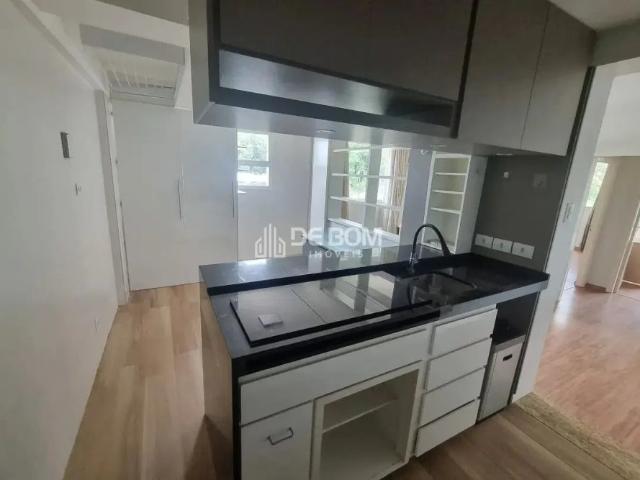 Apartamento para locação no centro de Poços, todo planejado, com área útil de 64 metros quadrados