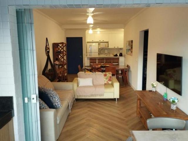 APARTAMENTO PRAIA DA ENSEADA com 2 dormitórios sendo 1 suíte,1 vaga de garagem,varanda gourmet com c