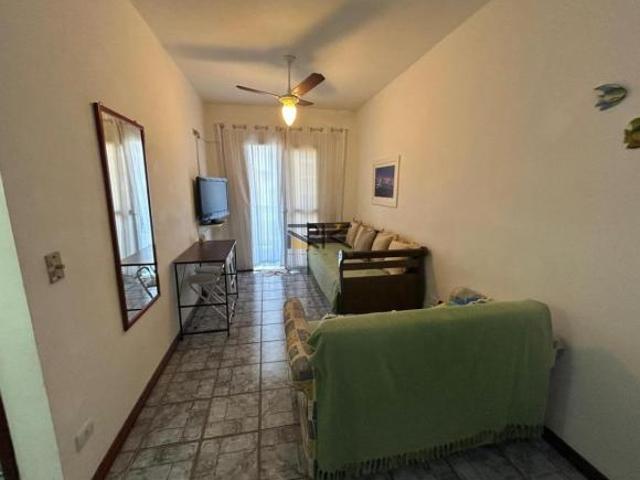 APARTAMENTO PRAIA GRANDE com 1 dormitório,1 vaga de garagem,sacada e cozinha