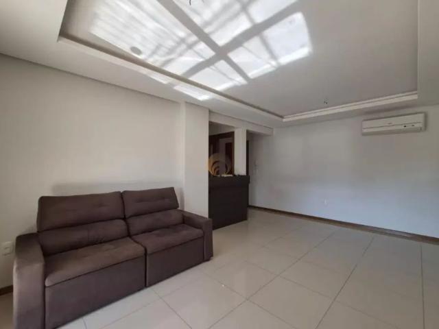 Apartamento semi mobiliado de dois dormitórios sendo uma súite, com vaga de gara
