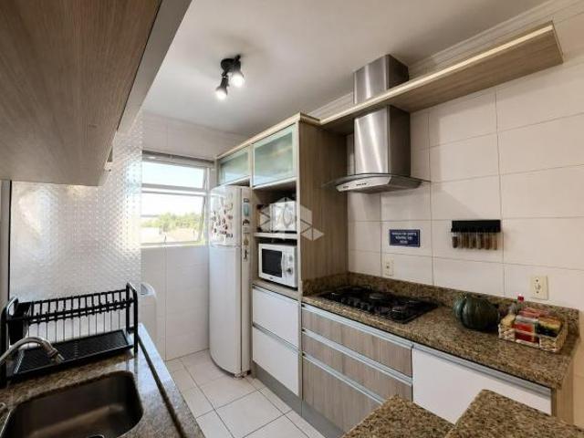 Apartamento semimobiliado, com 02 dormitórios, no Bairro Arroio Grande