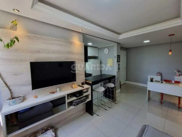 Apartamento semimobiliado com 2 dormitórios e 1 vaga de garagem no bairro Cavalhada!