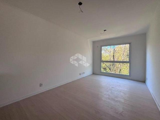 Apartamento semimobiliado de 2 dormitórios, sendo 1 suíte, próximo à UNISC