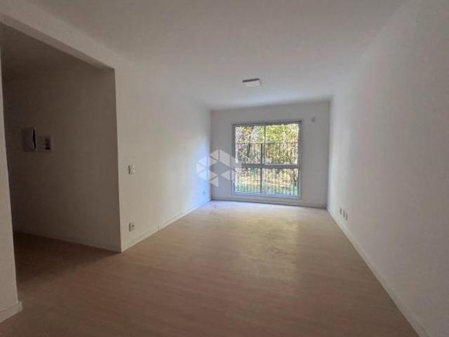 Apartamento semimobiliado de 2 dormitórios, sendo 1 suíte, próximo à UNISC