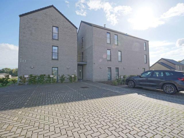 Appart. 2 ch.au rez avec terrasse + 2 places de parking!