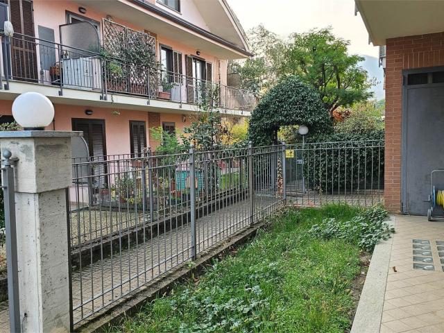 Appartamento con giardino privato e box auto