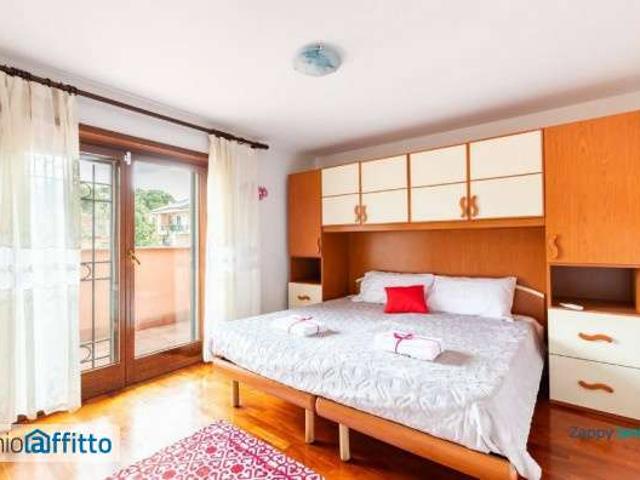 Appartamento arredato con terrazzo Infernetto, axa, casal palocco, madonnetta a roma