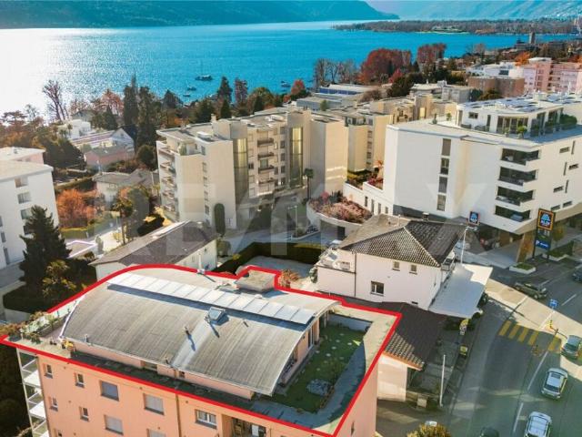Appartamento attico con bella vista lago